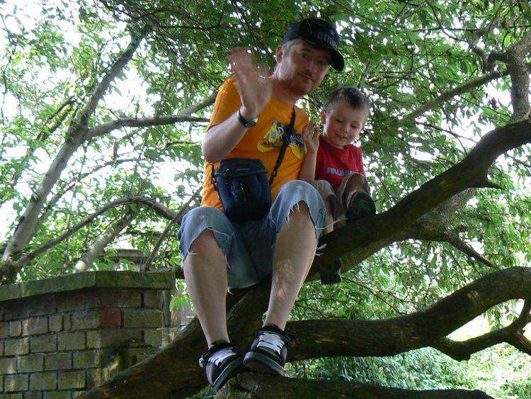 Me and dad climbing a tree